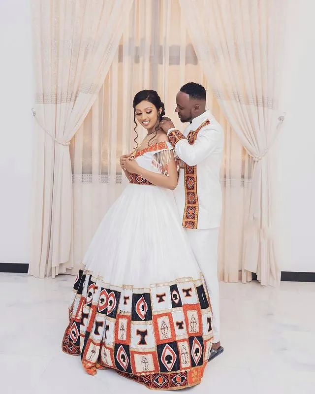 Red & Black Oromo Modern Wedding Attire Stylish Oromo Couple's Outfit