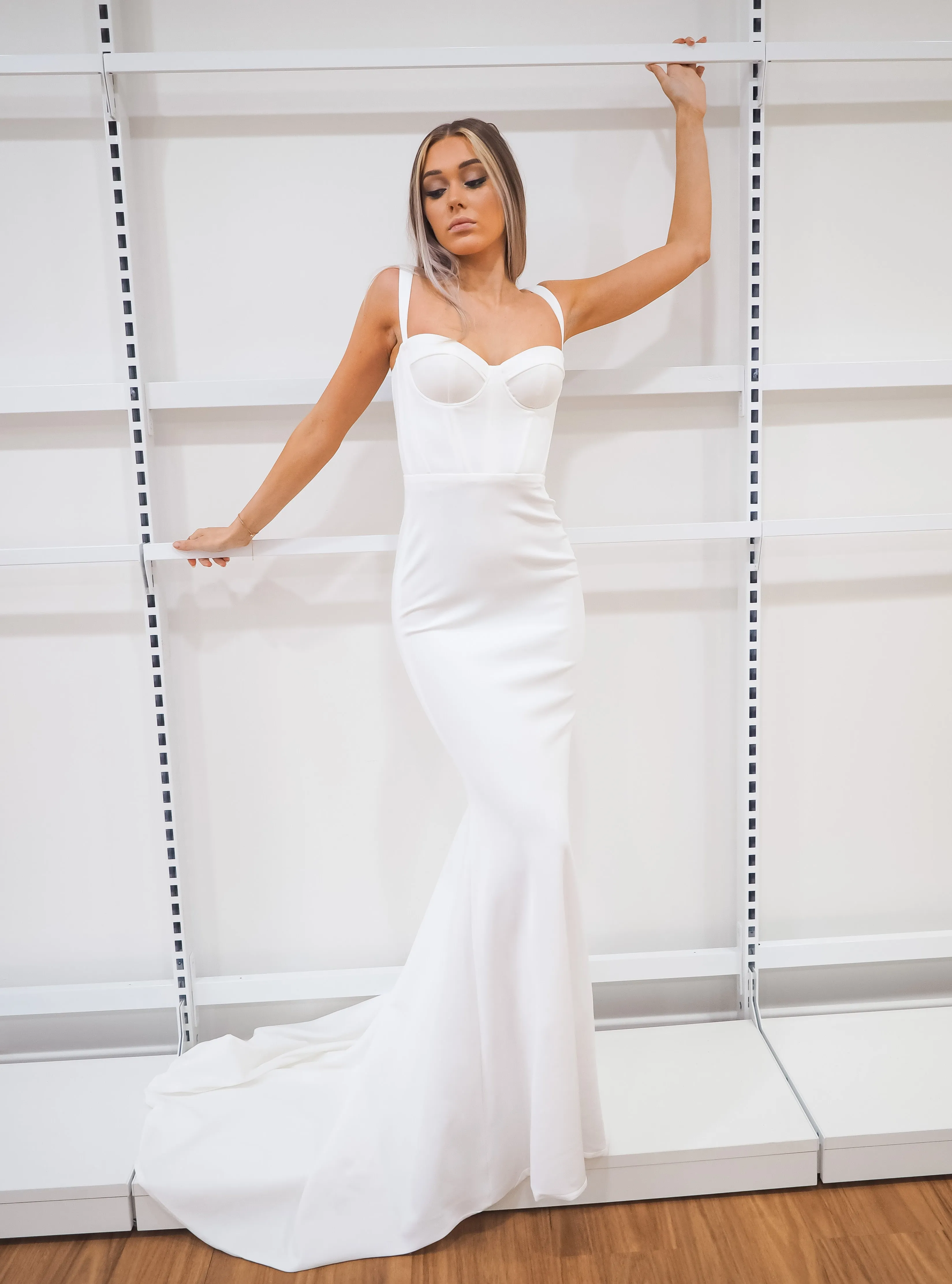 White bustier mermaid dress with lace up back for hire