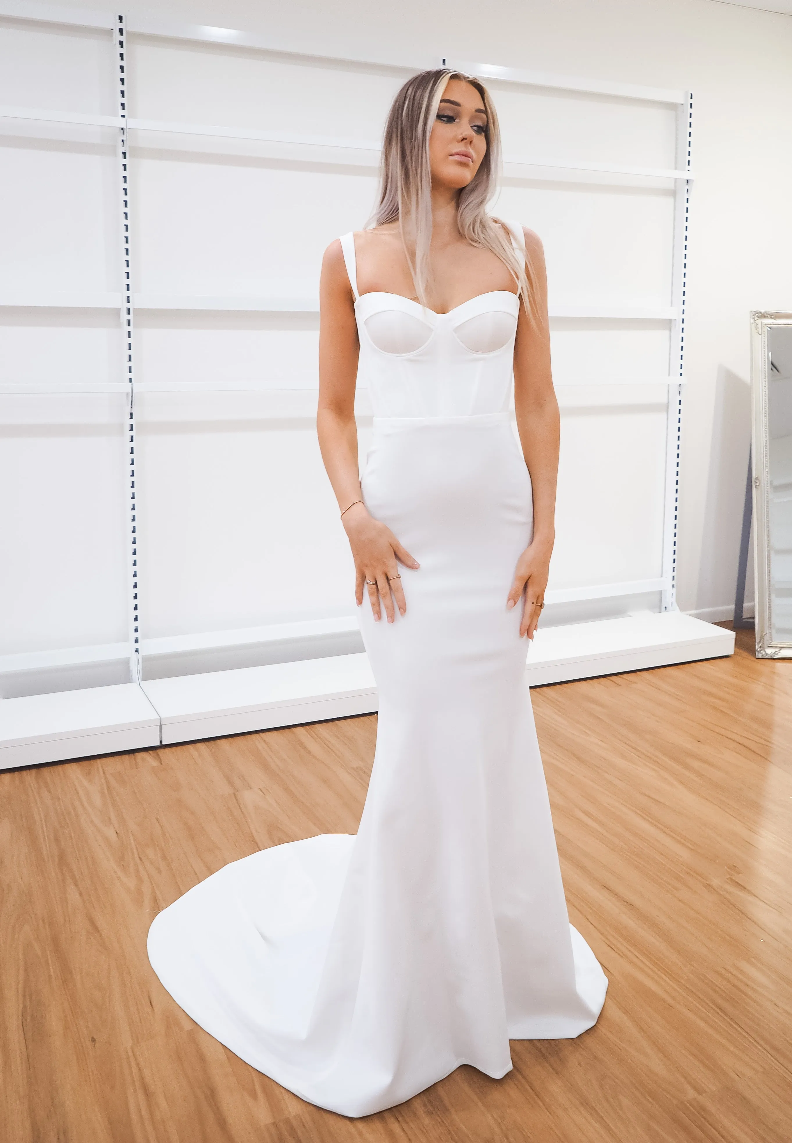 White bustier mermaid dress with lace up back for hire