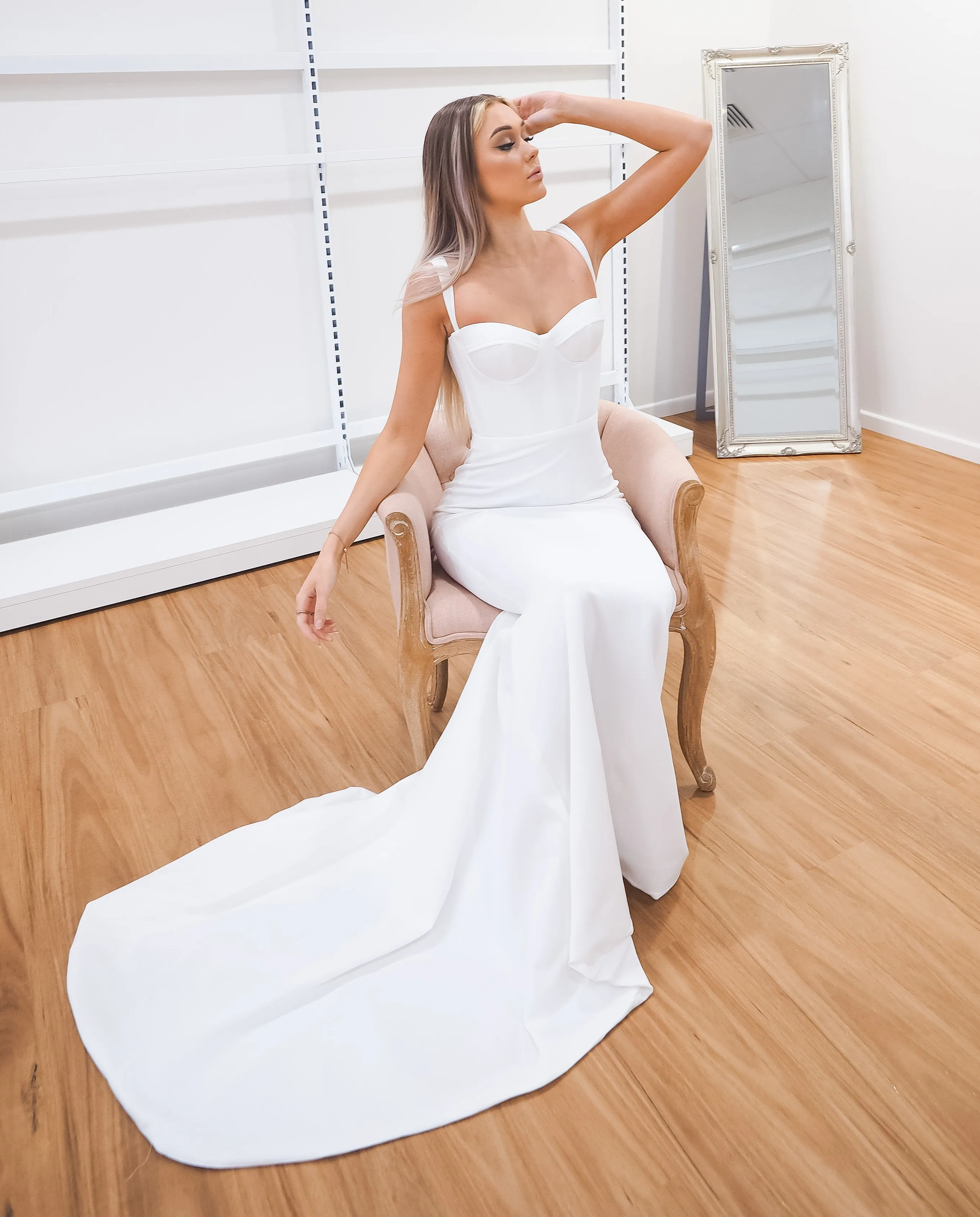 White bustier mermaid dress with lace up back for hire
