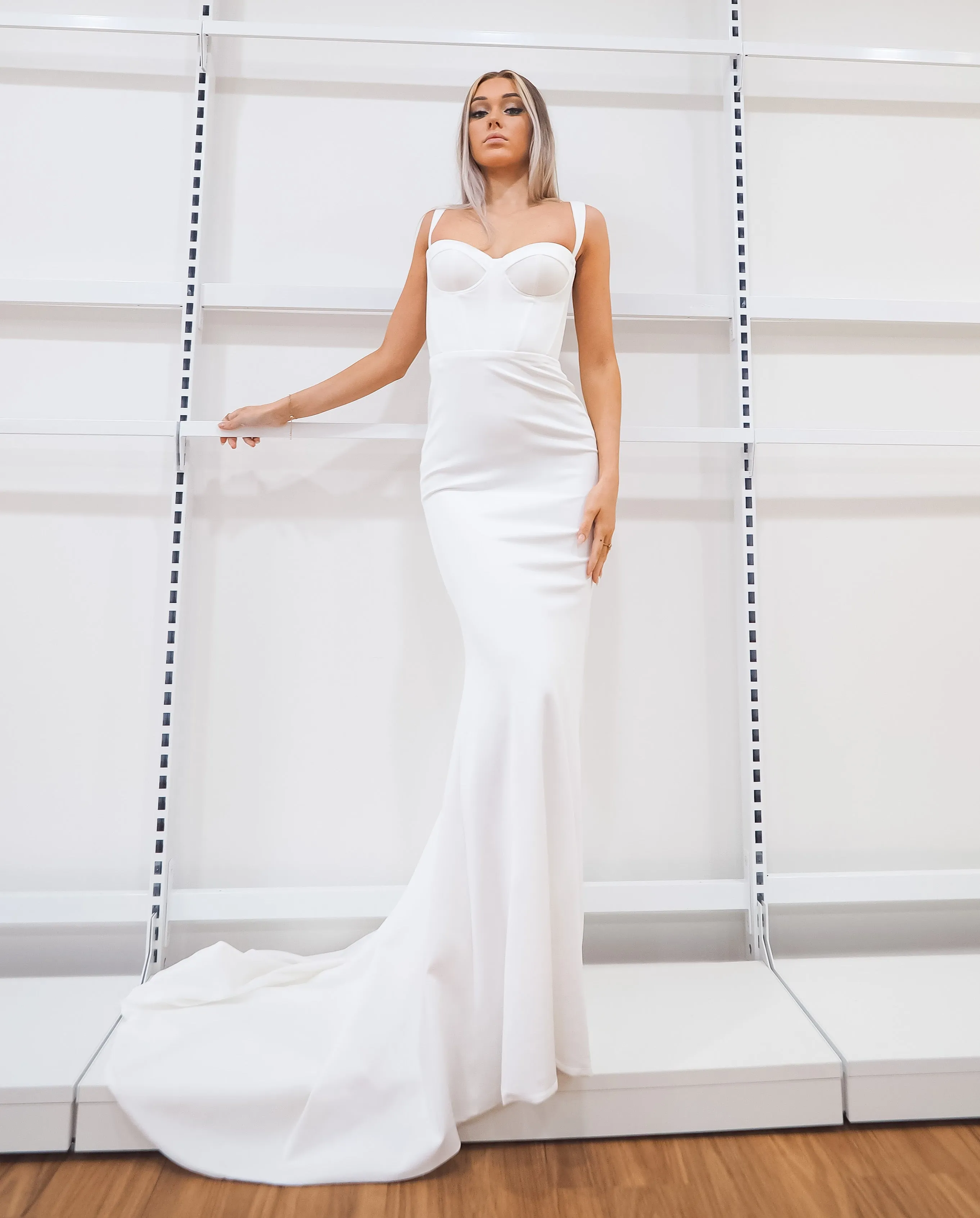 White bustier mermaid dress with lace up back for hire