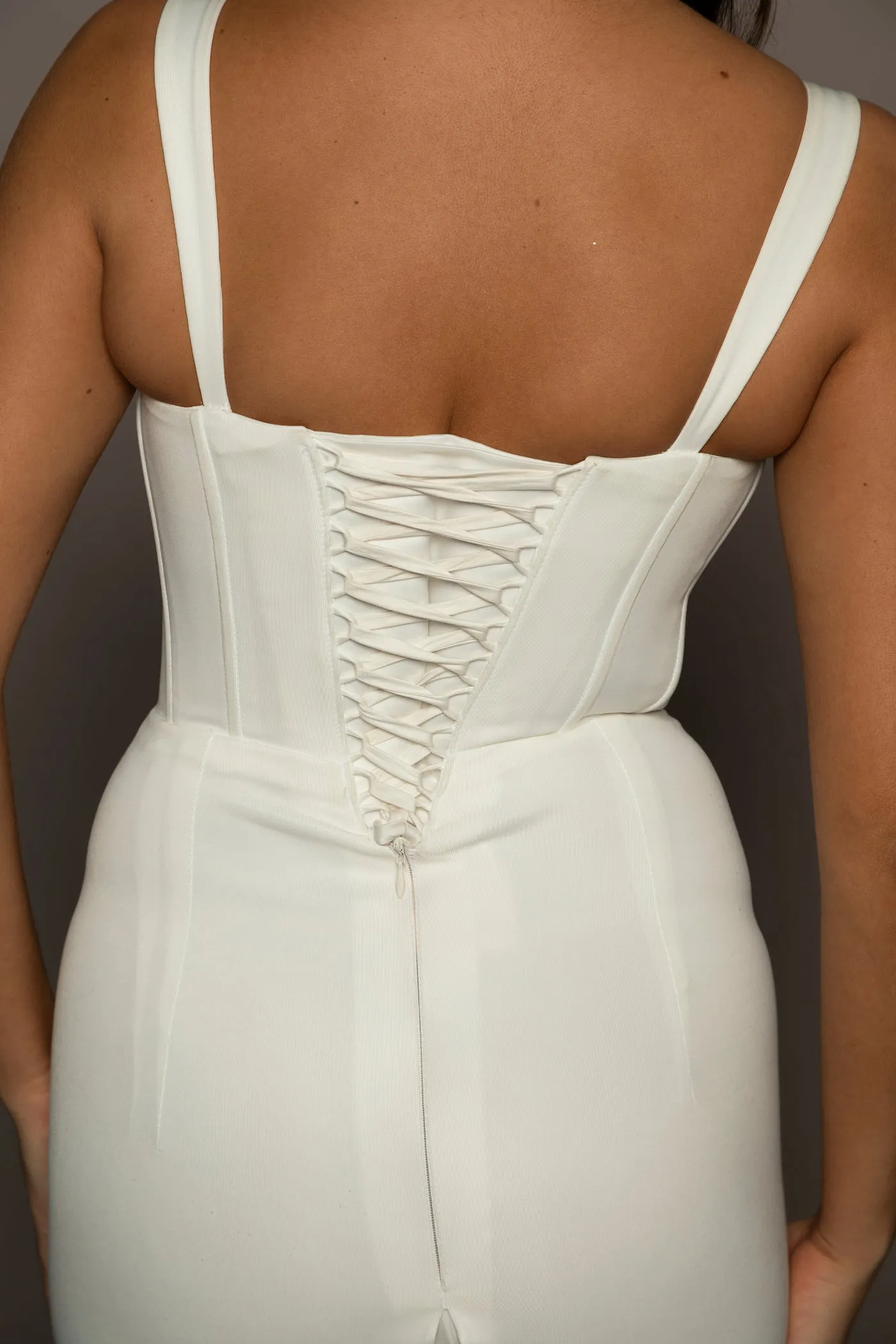 White bustier mermaid dress with lace up back for hire