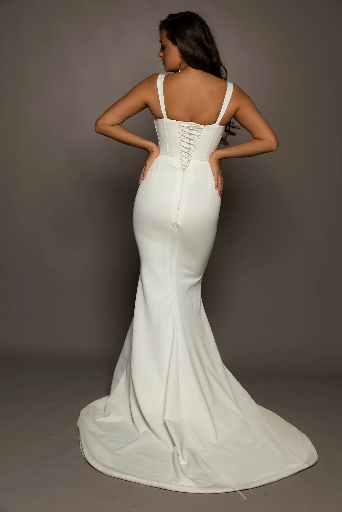 White bustier mermaid dress with lace up back for hire
