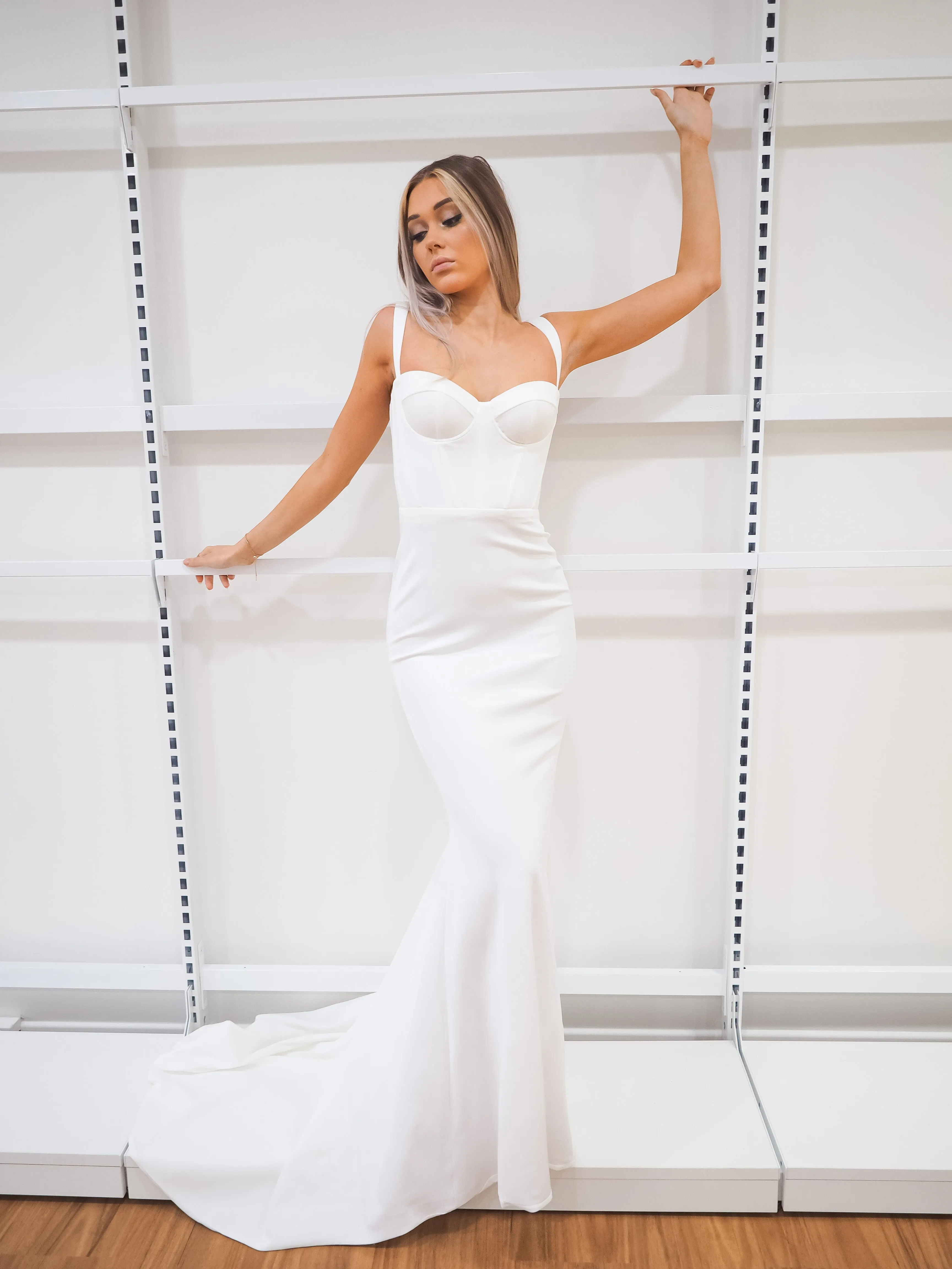 White bustier mermaid dress with lace up back for hire