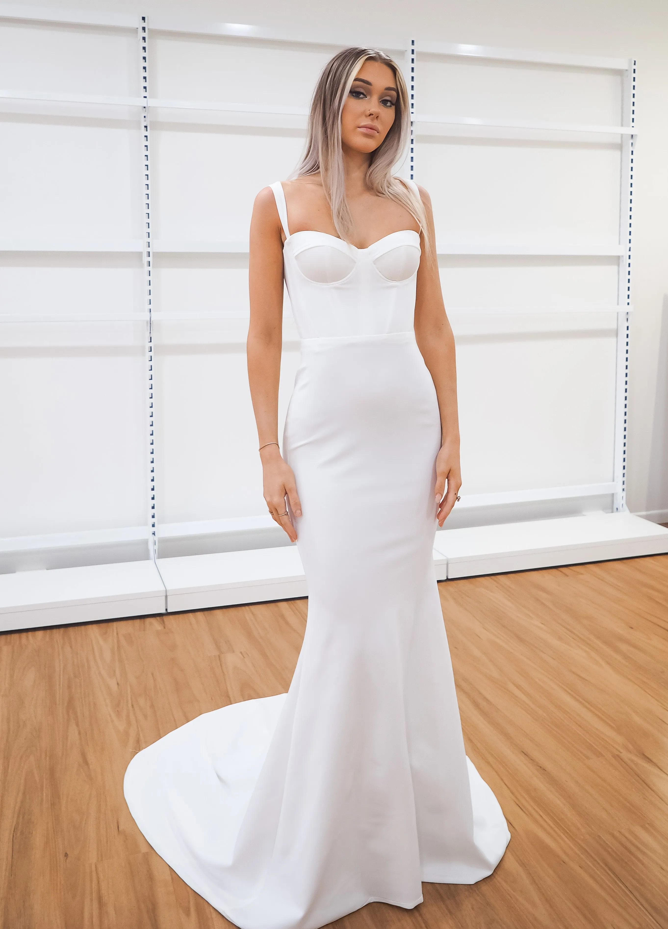 White bustier mermaid dress with lace up back for hire