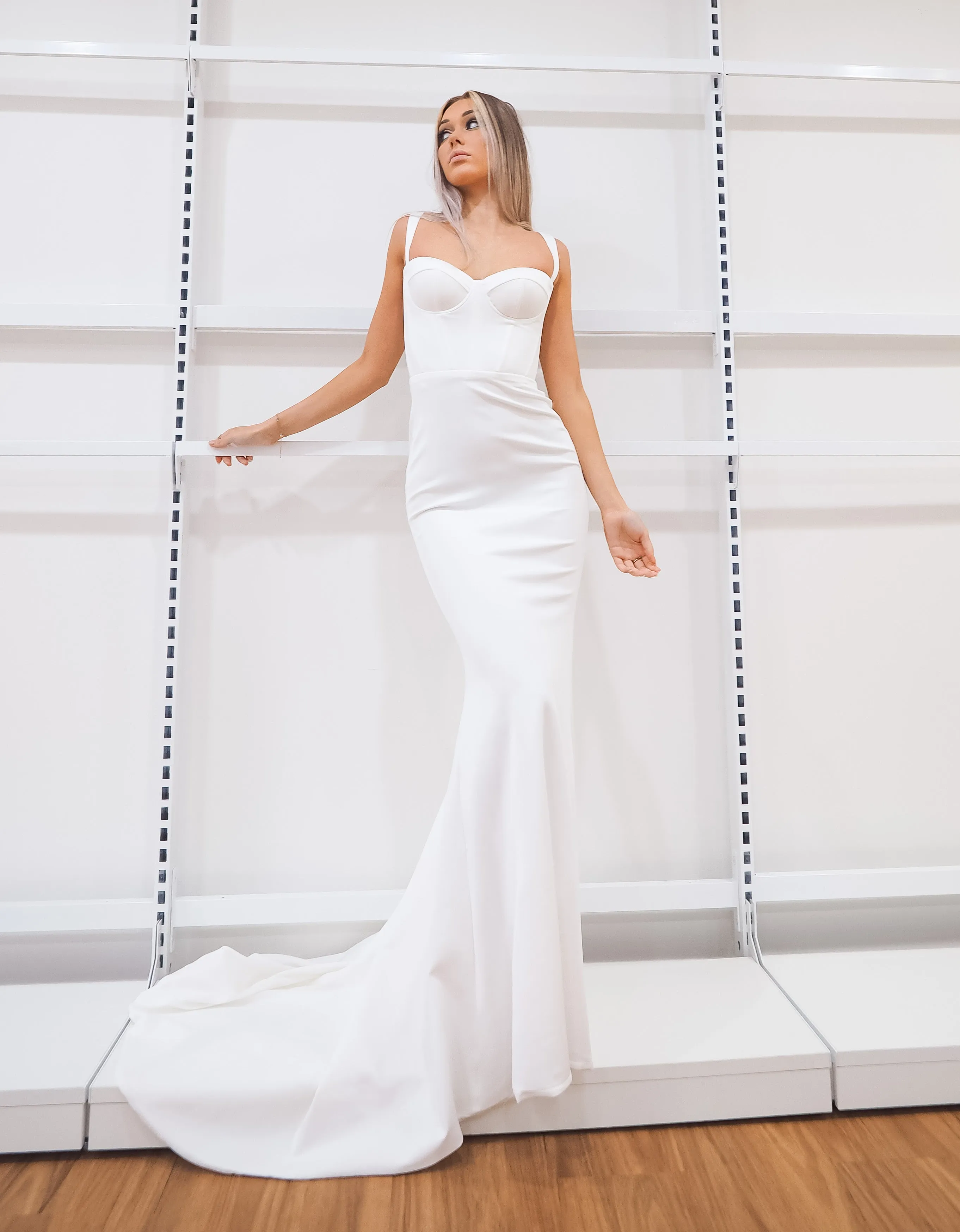 White bustier mermaid dress with lace up back for hire