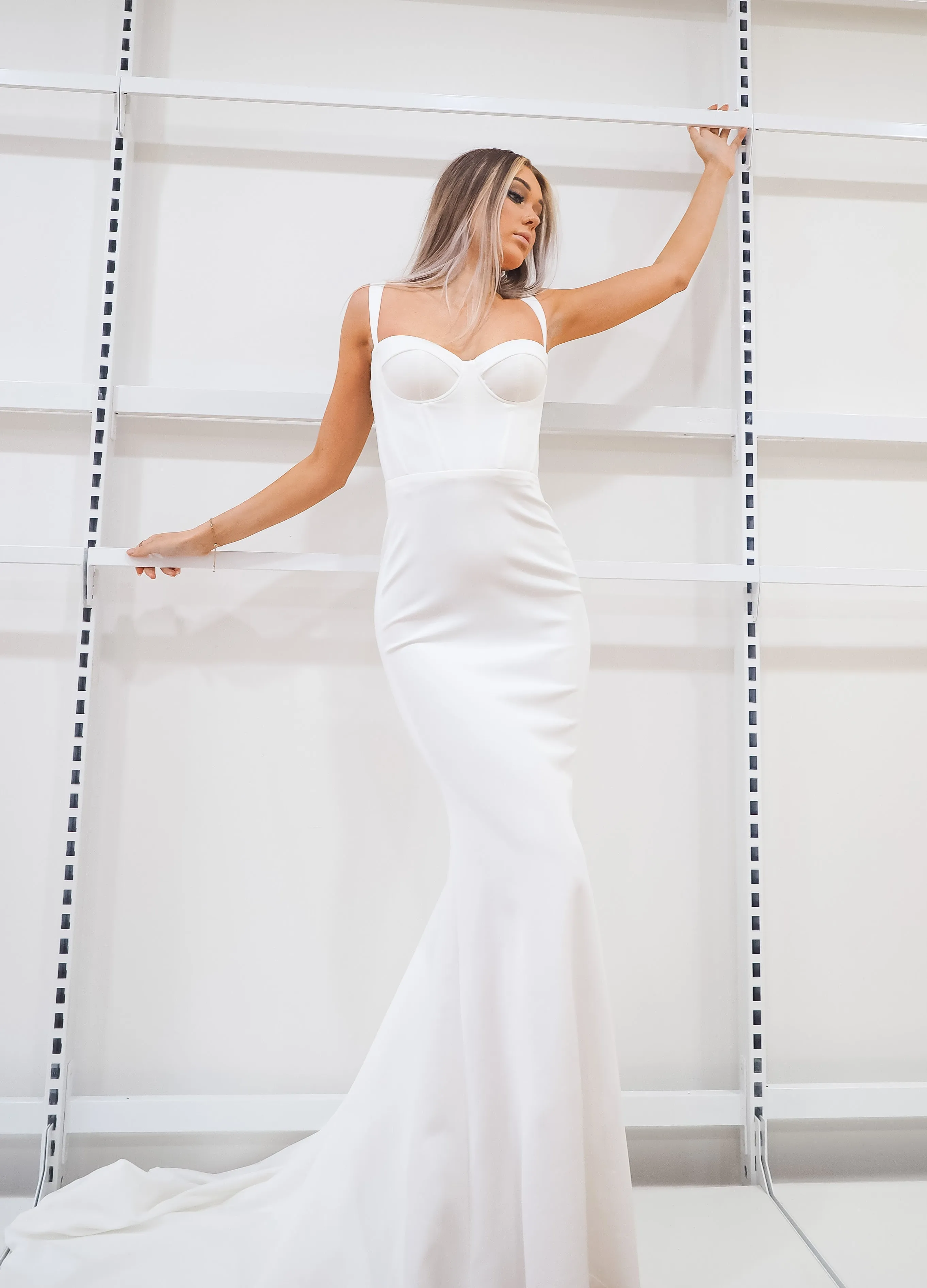 White bustier mermaid dress with lace up back for hire