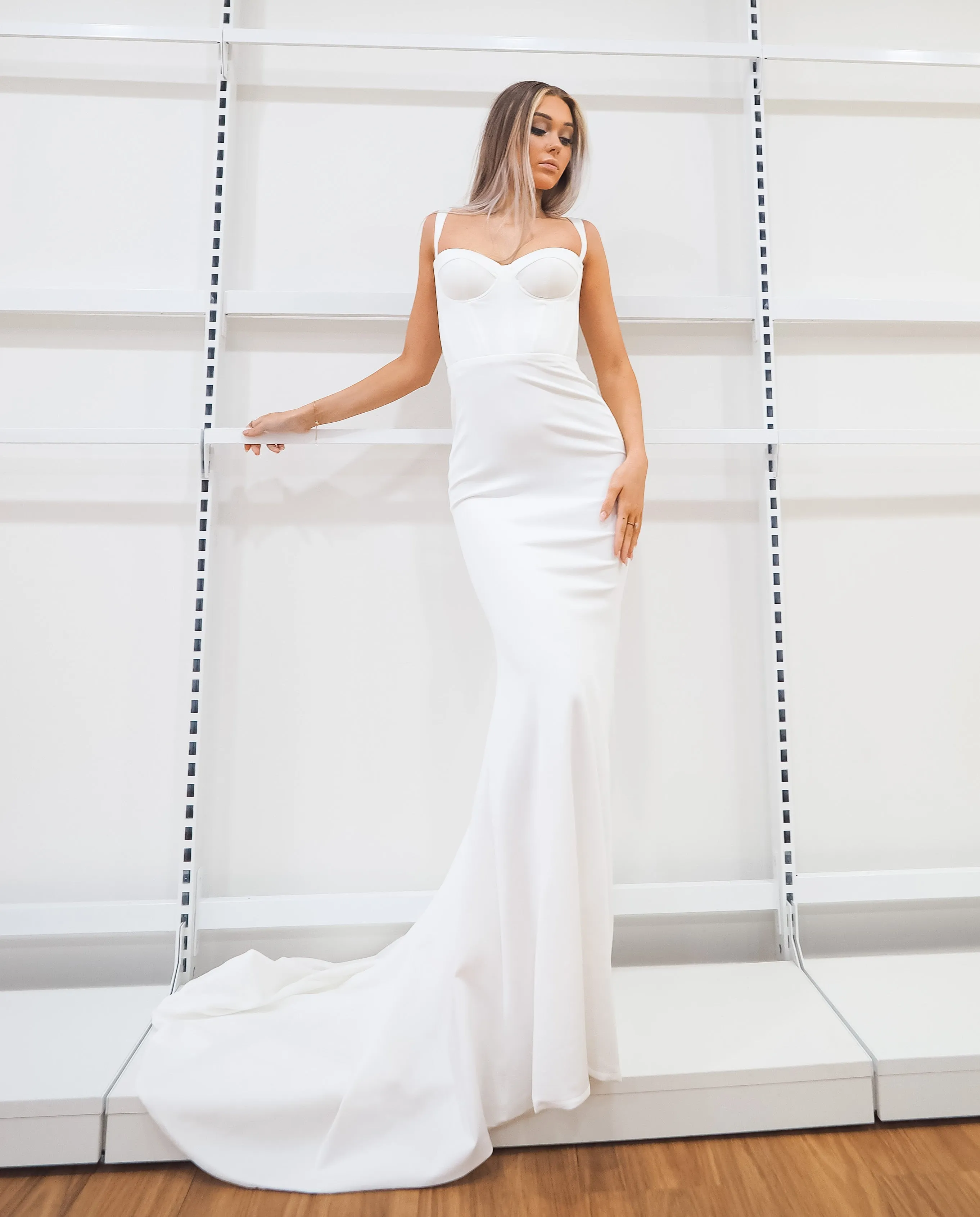 White bustier mermaid dress with lace up back for hire